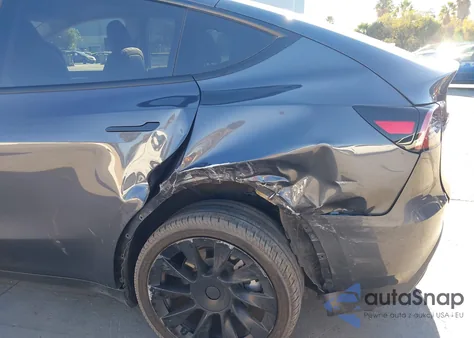 2023 Tesla Model Y Rwd из США, поврежденный, VIN 7SAYGDED5PF980101